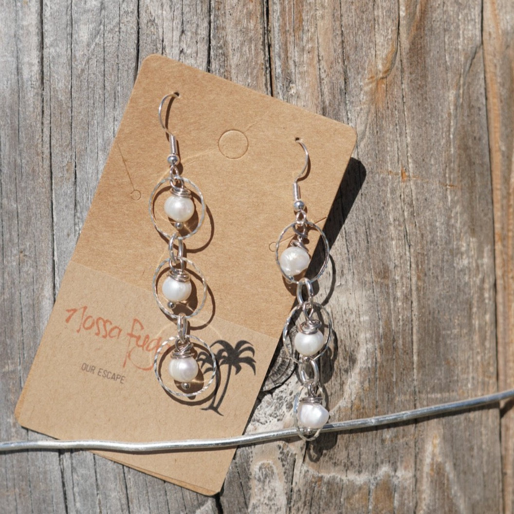 Three Dangling Pearls